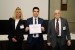 Prof. Suzanne Lunsford and Dr. Nagib Callaos giving Prof. Alejandro Bogantes the best paper award certificate of the session "Sistemas de Información y sus Aplicaciones en Gestión de la Calidad y Otras Áreas de la Universidad Estatal a Distancia (UNED), Costa Rica." The title of the awarded paper is "El Rol de la Seguridad Informática en el Ámbito Académico y los Sistemas de Información Asociados."